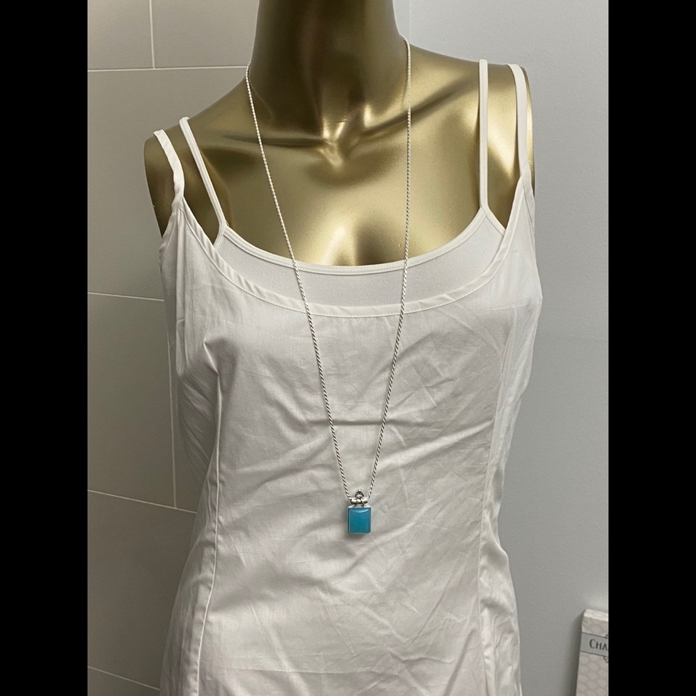 “Paraiba” chalcedony and blue topaz silver pendant